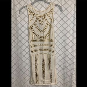 Bebe crème color body con dress with gold bedazzled